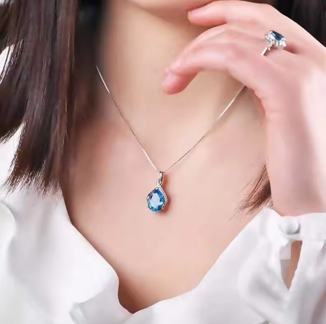 Blue Topaz Radiance Pendant Necklace