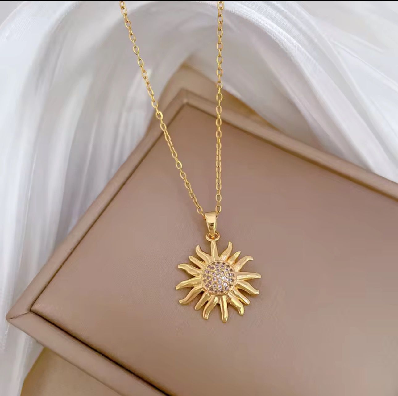 Radiant Sunburst Gold Pendant Necklace with Crystal Accents