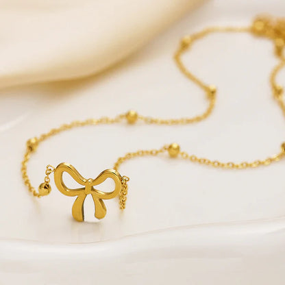 Gold-Plated Infinity Bow Pendant