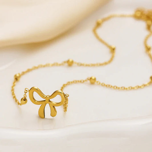 Gold-Plated Infinity Bow Pendant